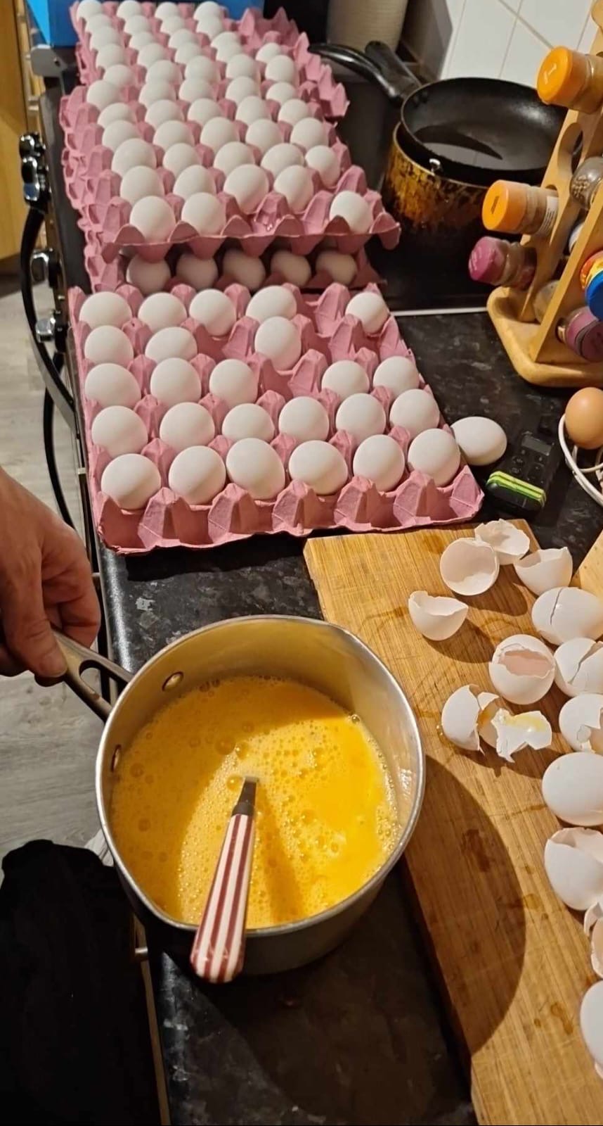 Whisking fresh eggs in the kitchen